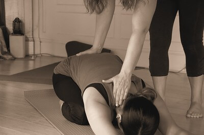 Patient receiving yoga therapy